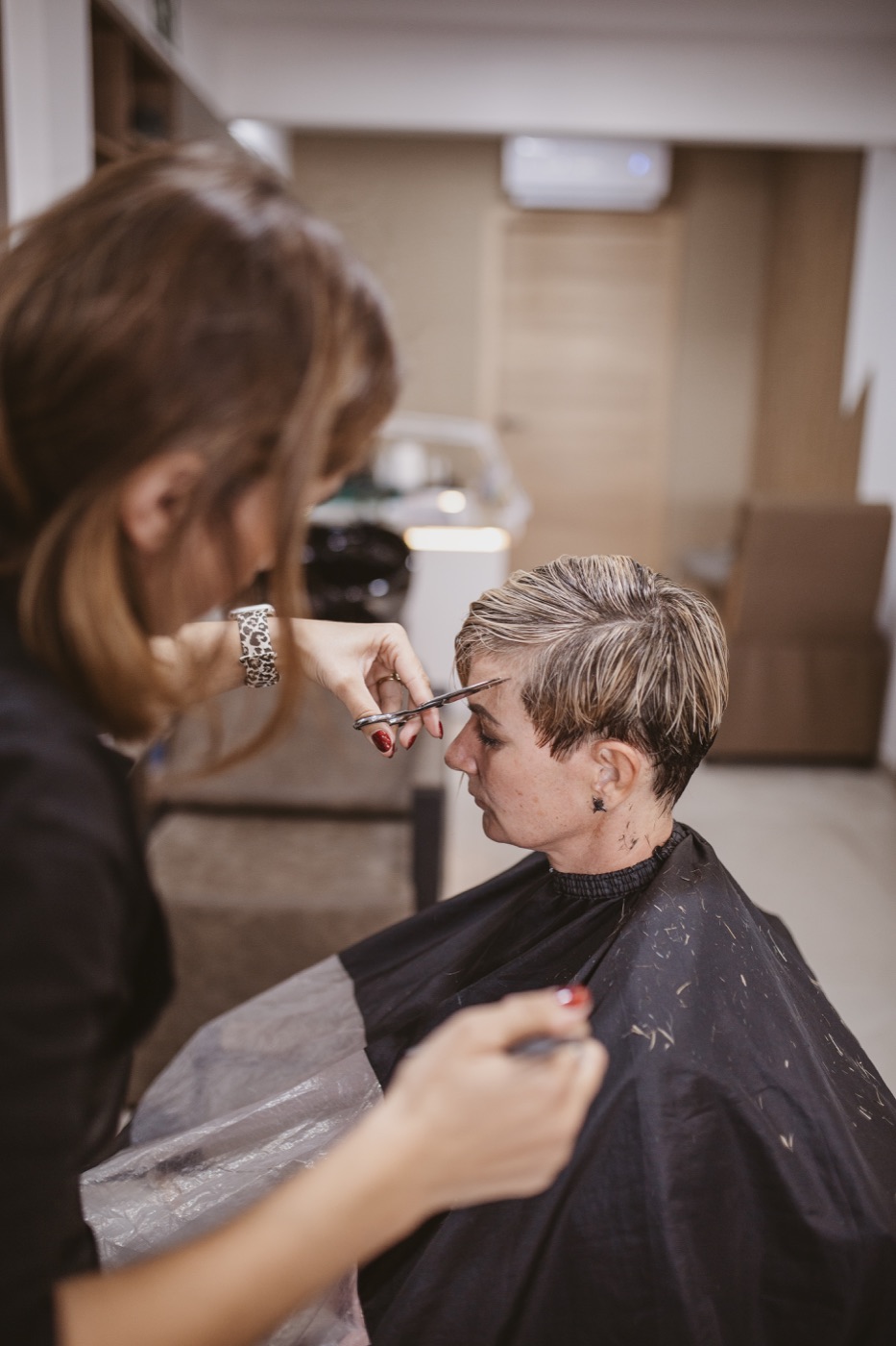 Haircut in progress at Sara Bella Beauty Studio