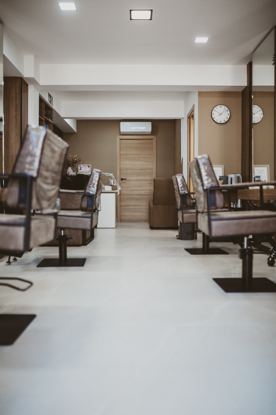 Sara Bella Beauty Studio salon interior with styling chairs