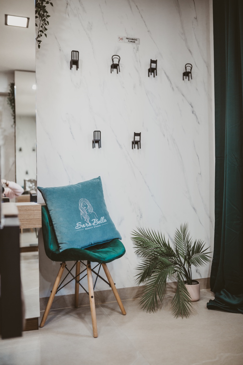 Salon seating and waiting corner at Sara Bella Beauty Studio